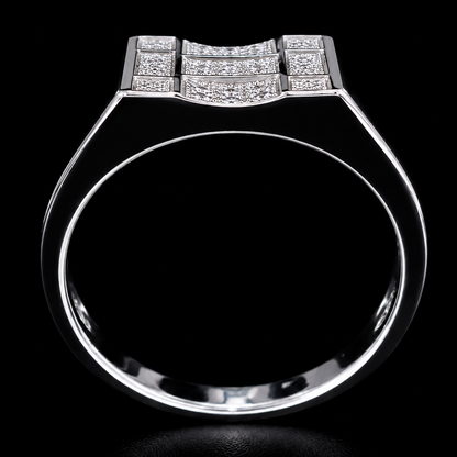 A silver ring with a geometric design and small CZ stones.