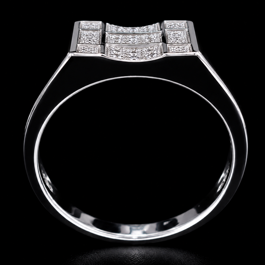 A silver ring with a geometric design and small CZ stones.