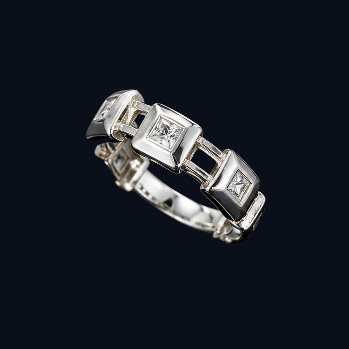 A silver ring with a chain design and CZ stones.