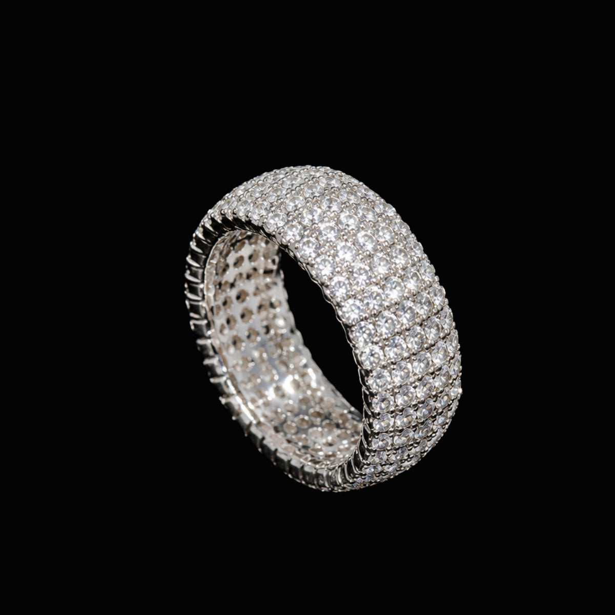 A silver ring with a band of clear CZ stones.