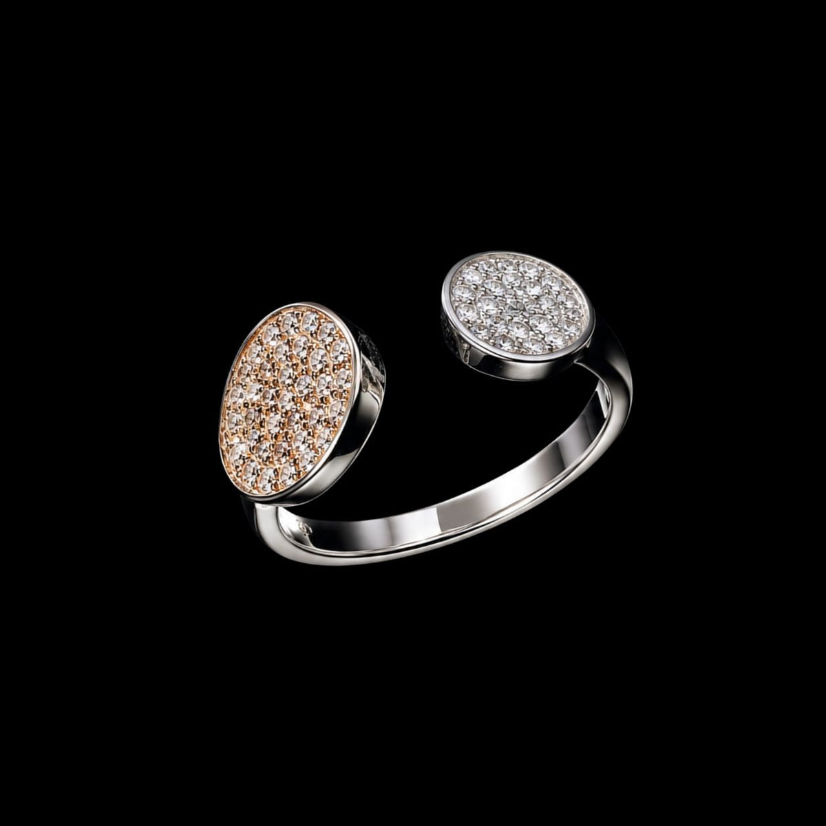 A silver-tone ring with a cluster of clear cubic zirconia stones on a black background.