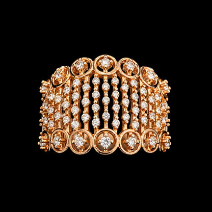 A rose gold ring with a floral design and CZ stones.