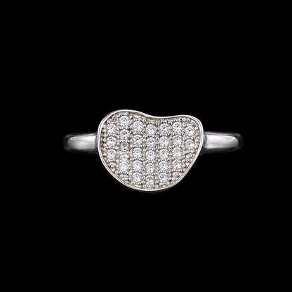 A silver ring with a heart-shaped design and CZ stones.