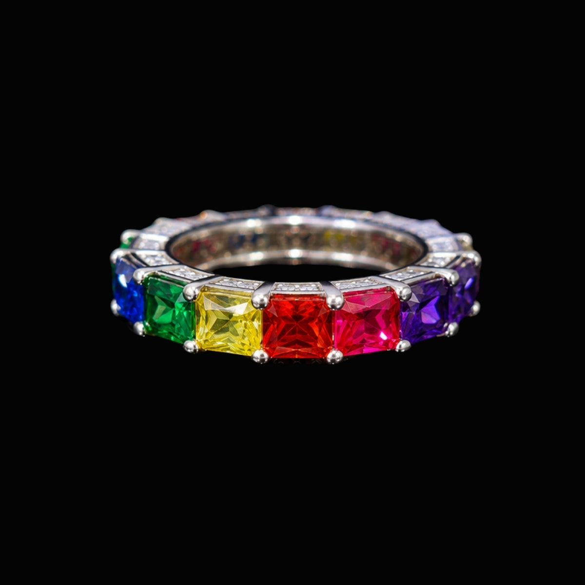A silver ring with a rainbow of CZ stones