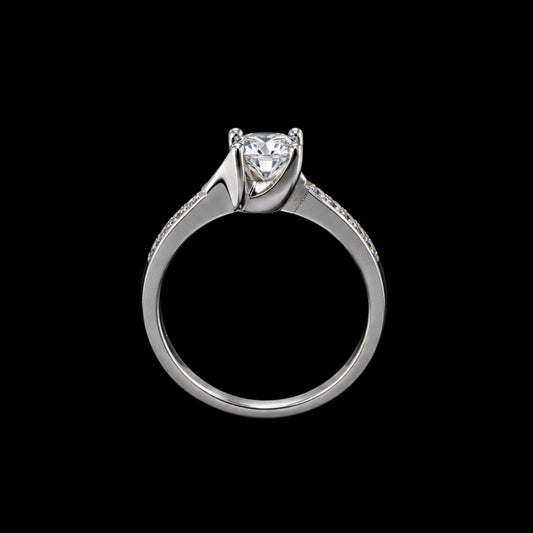 A silver ring with a large clear cubic zirconia stone and smaller stones on the band.