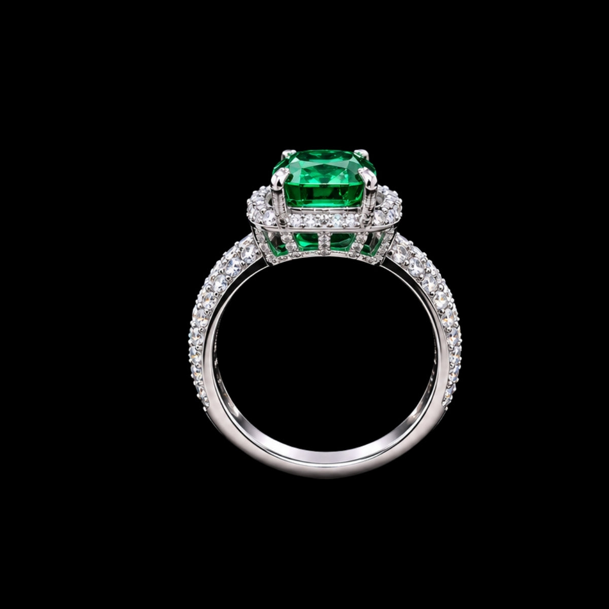 A silver ring with an emerald stone and CZ stones on a black background