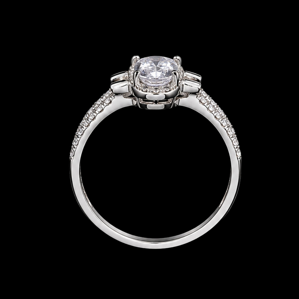 A silver ring with a round-cut CZ stone on a black background