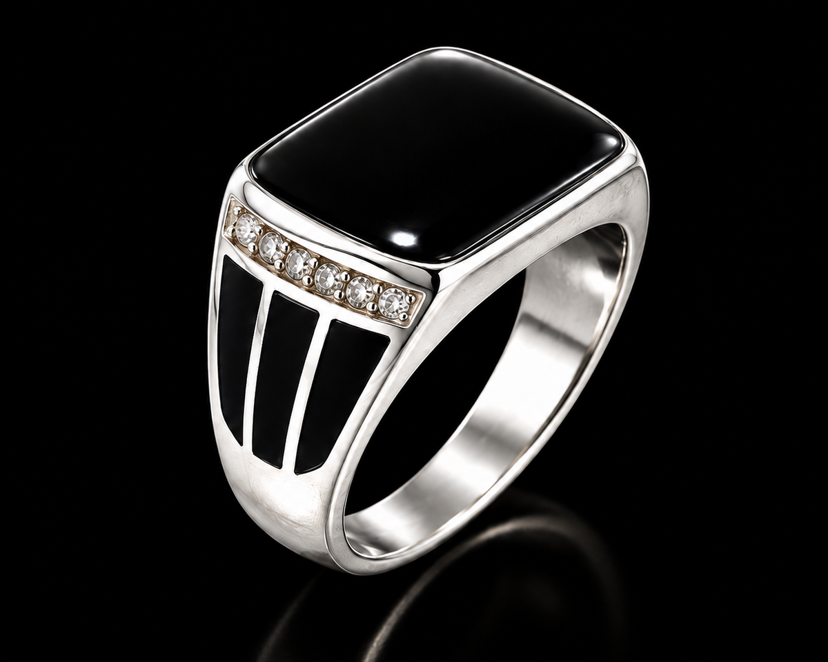 A square black onyx ring with a silver tone and adjustable closure.