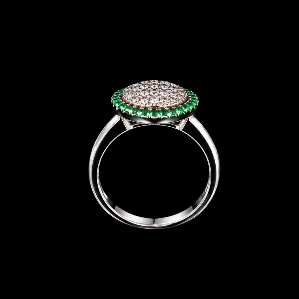 A silver ring with an oval-shaped cluster of clear cubic zirconia stones surrounded by a green enamel border.