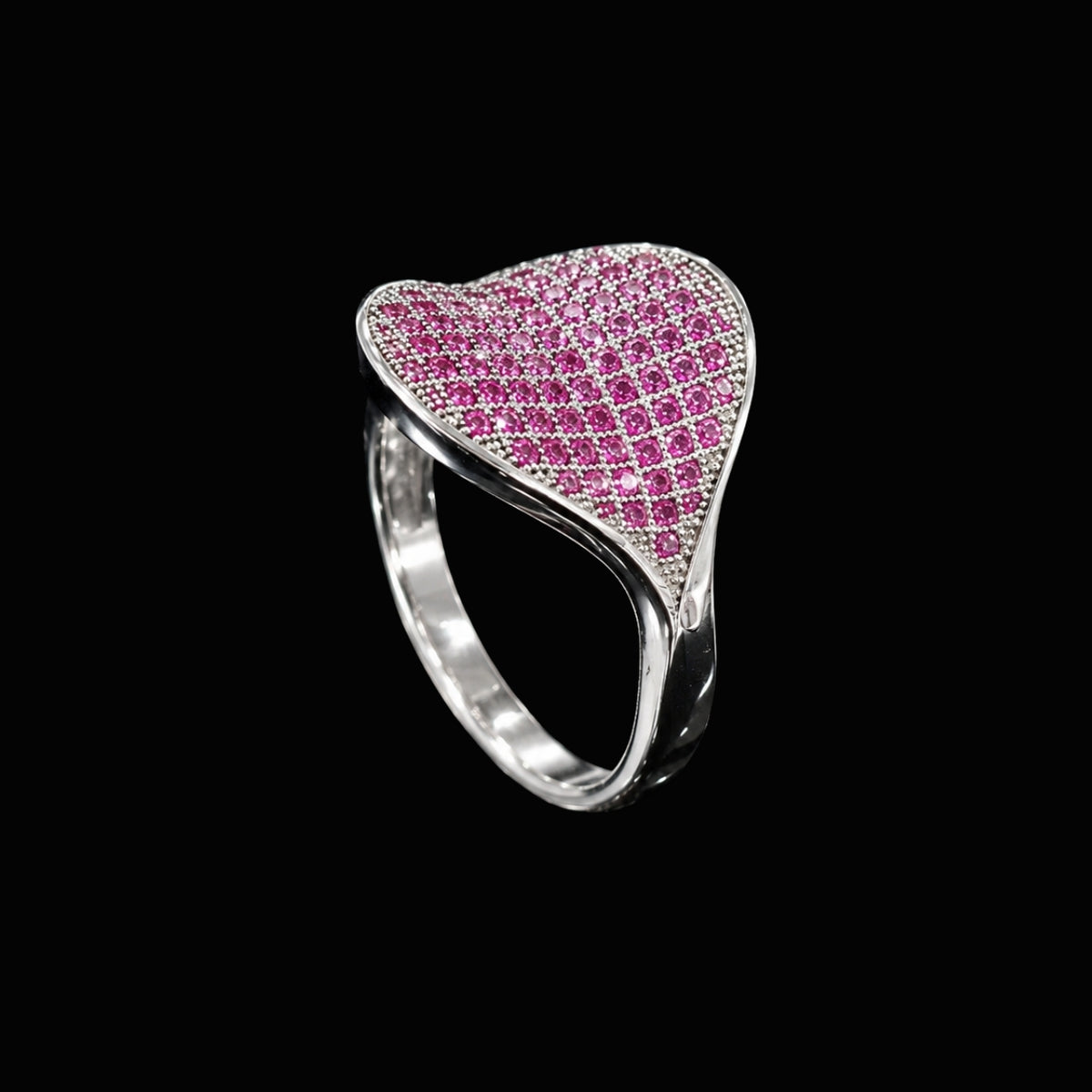 A heart-shaped ring with CZ stones on a silver band.