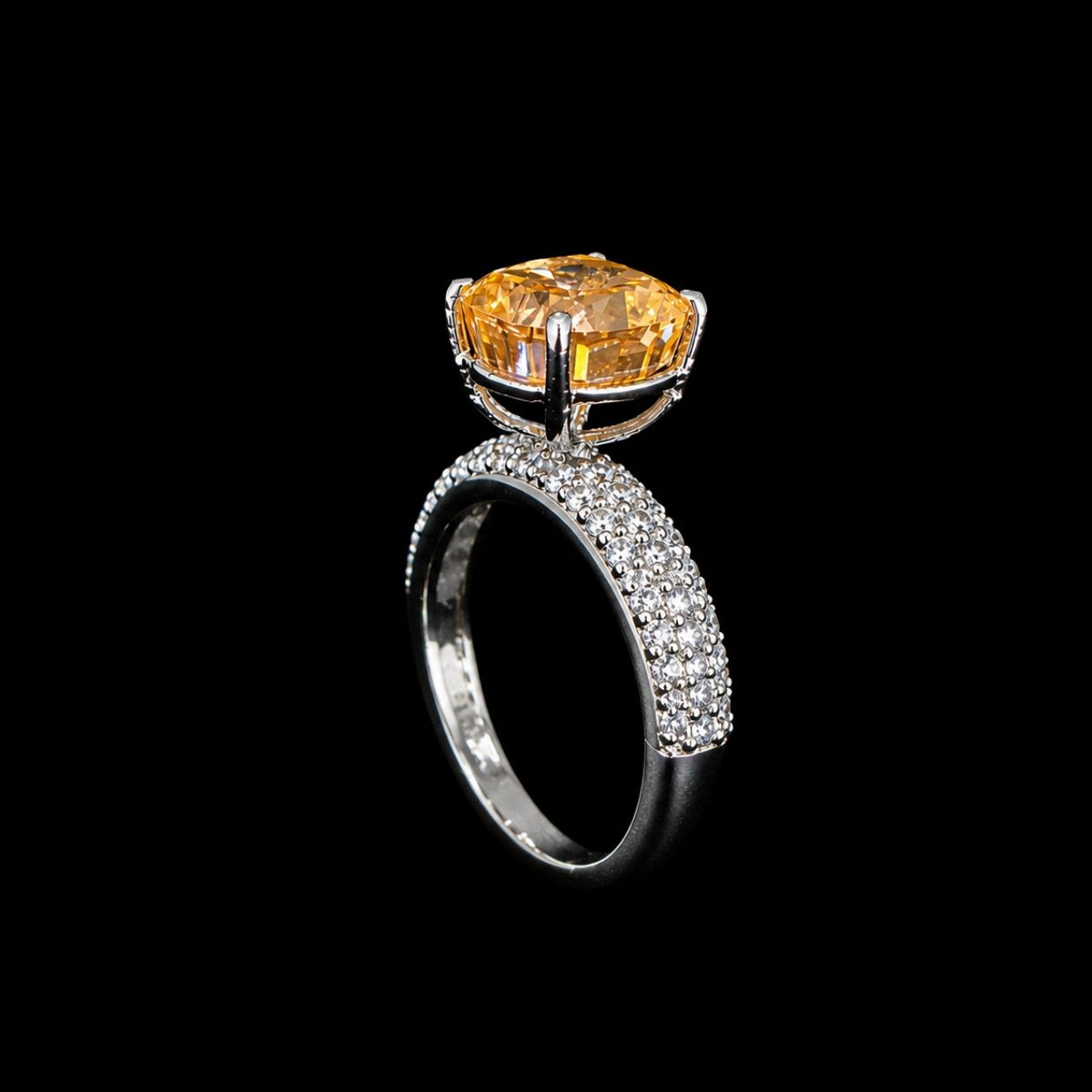 A citrine ring with a large, faceted stone set in a silver-tone setting.