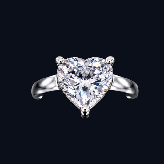 A silver ring with a heart-shaped clear CZ stone.