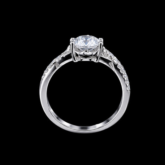 A silver-tone ring with a large clear CZ stone and smaller stones on the band.