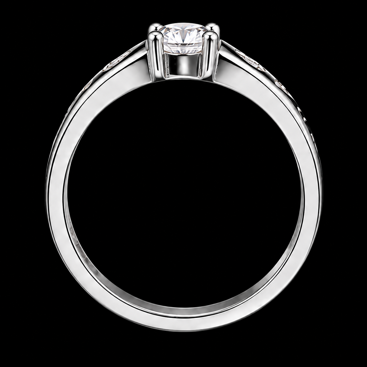 A silver ring with a round-cut cubic zirconia stone on a black background