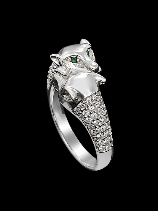 A silver ring with a panther design and CZ stones.