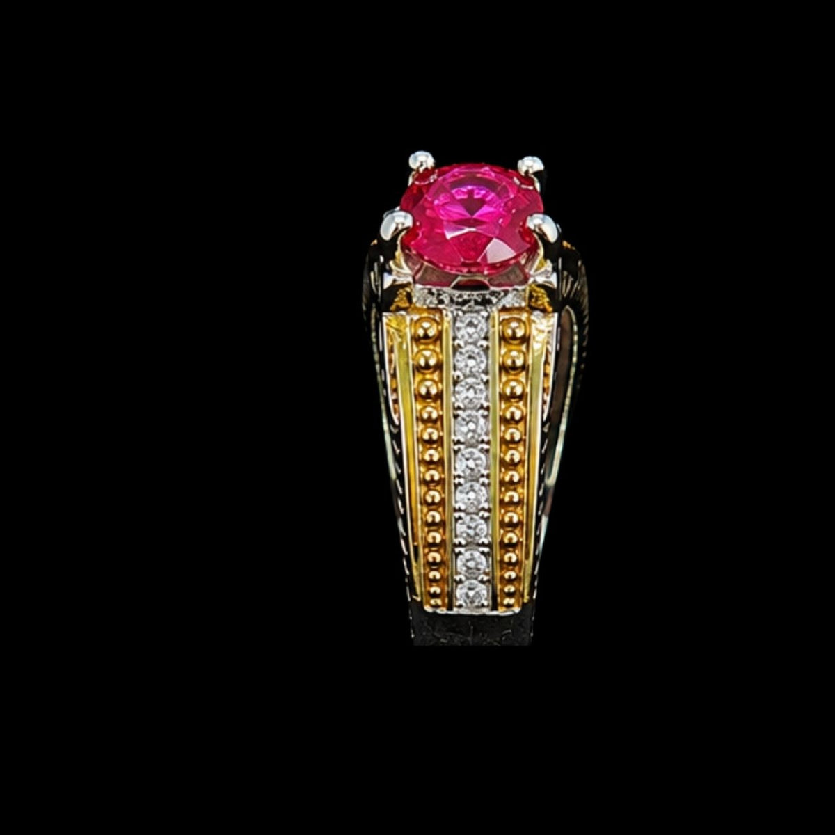 A gold-tone ring with a pink CZ stone, set in a geometric design.