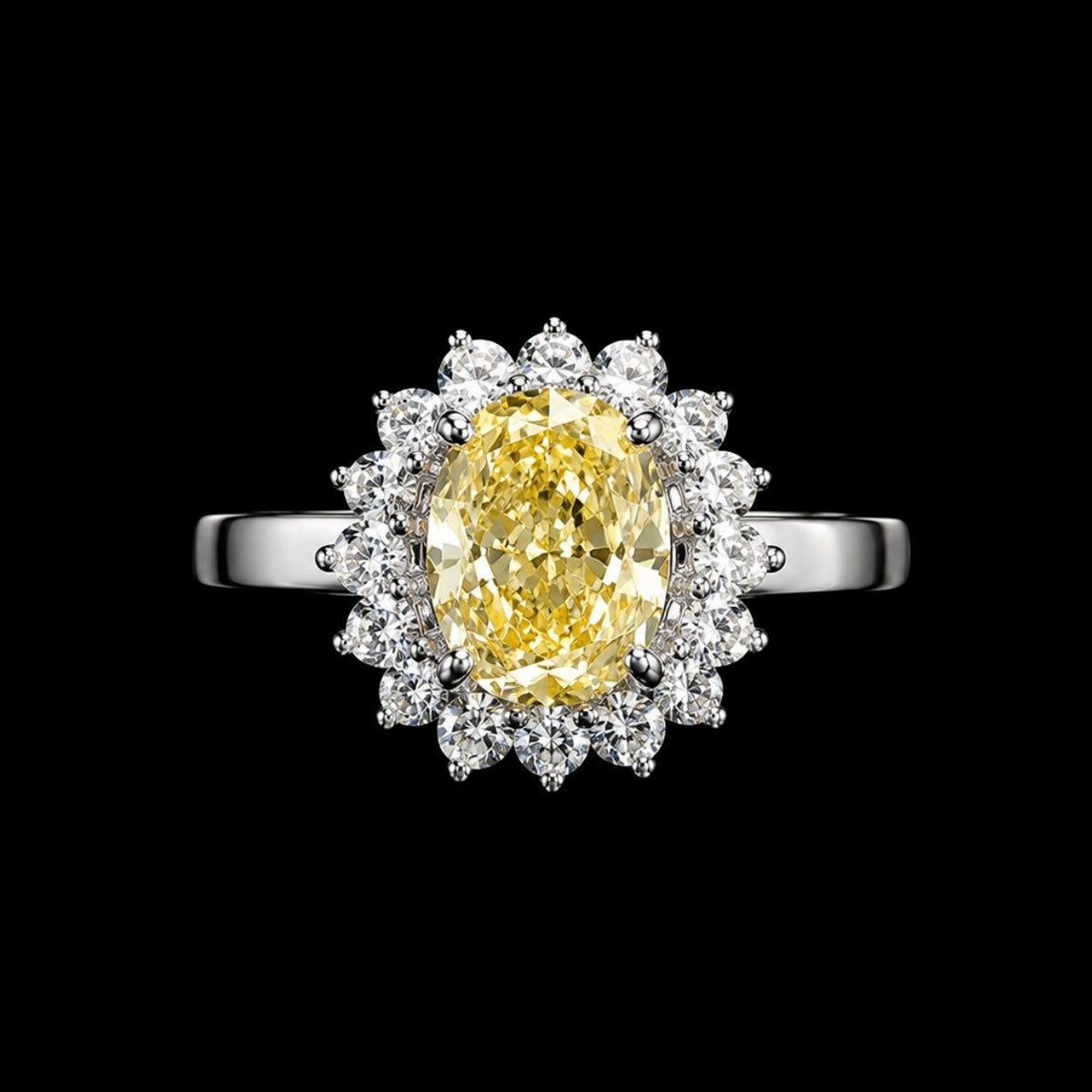 A silver ring with a yellow CZ stone and clear CZ stones surrounding it.