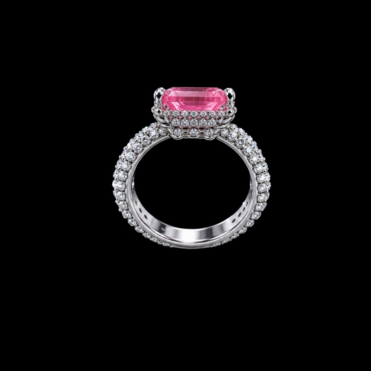 A silver-tone ring with a pink CZ stone and clear CZ accents.
