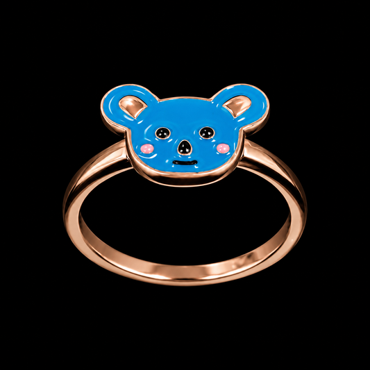 A blue koala ring with a gold-tone band and enamel design.