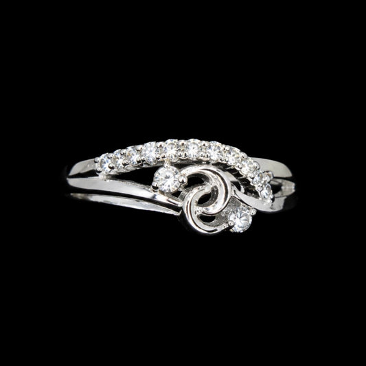 A silver ring with a swirl design and CZ stones.