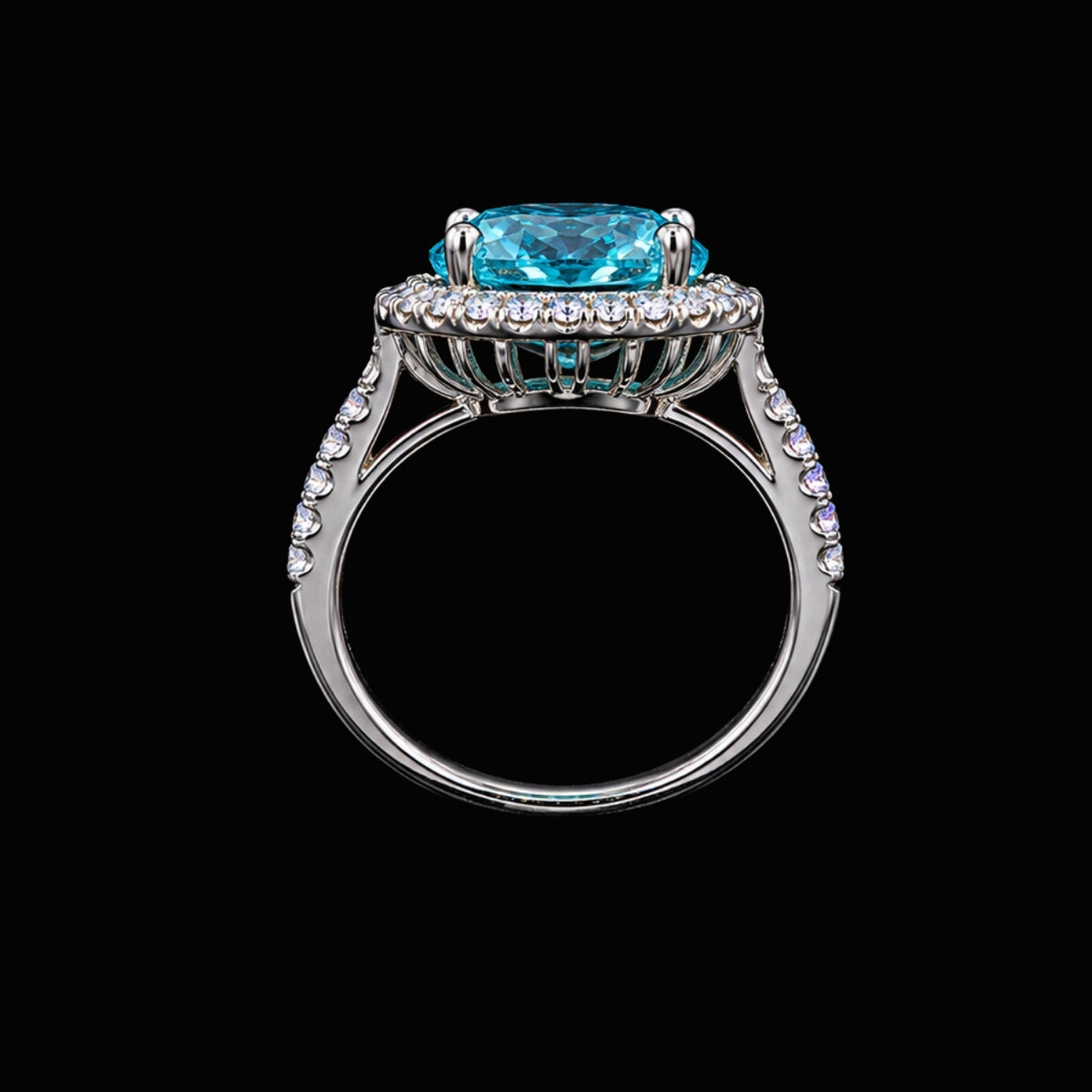 A silver ring with a large blue gemstone and smaller stones around it, set against a dark background.