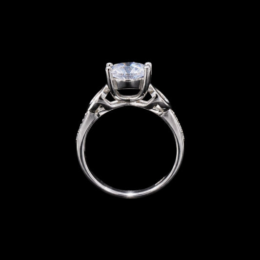 A silver-tone ring with a large, clear cubic zirconia stone.