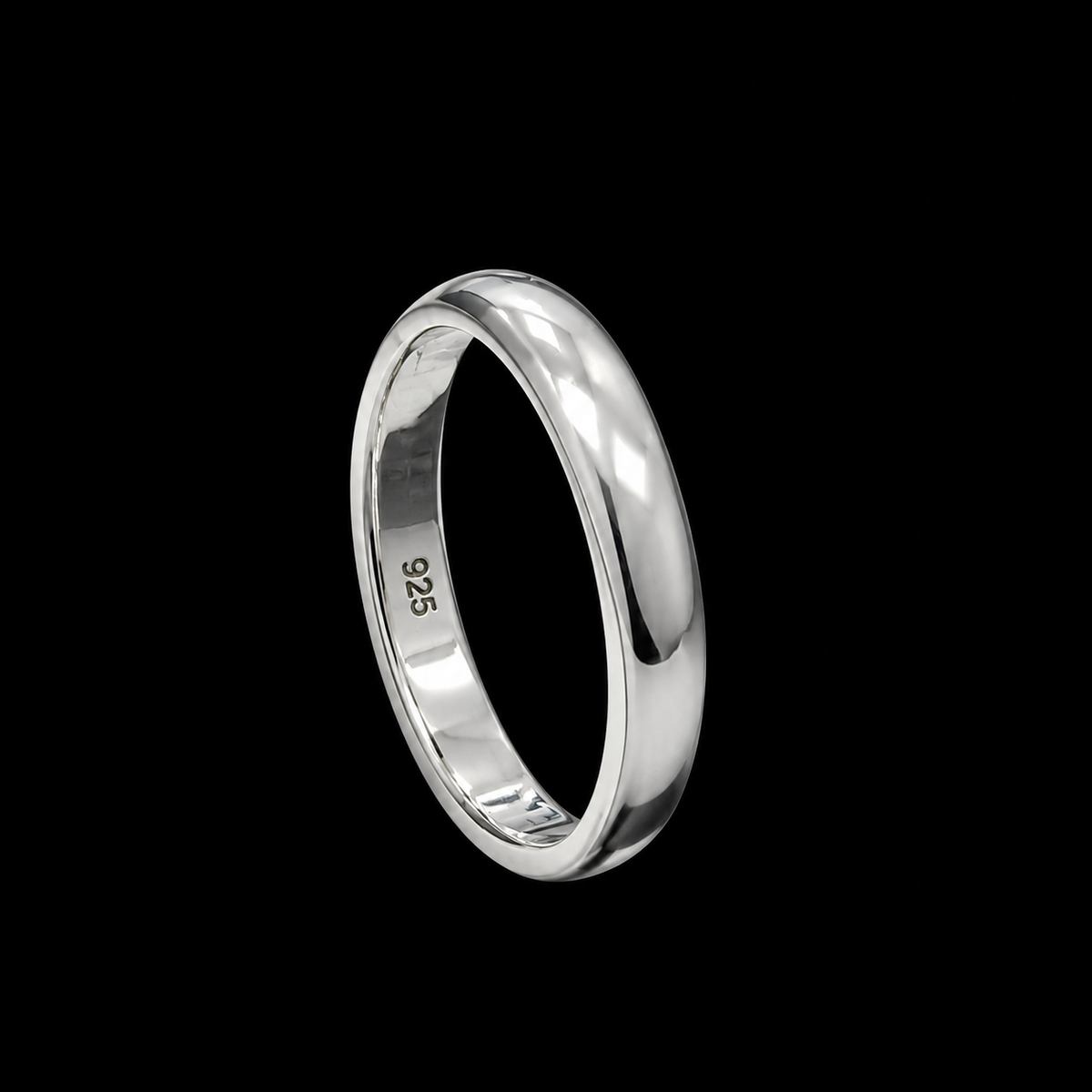 A silver band ring with a smooth, polished finish.