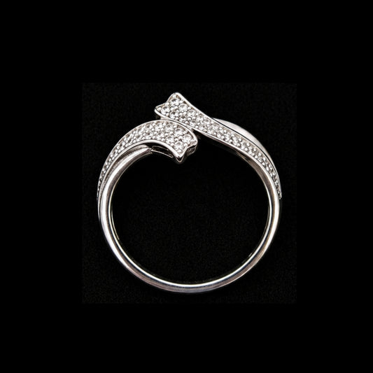 A silver ring with a CZ stone design.