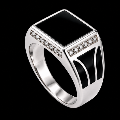 A square-shaped ring with black enamel and clear cubic zirconia stones on a silver band.