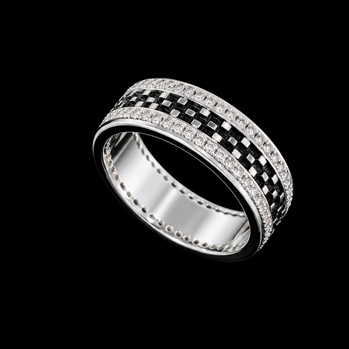 A silver ring with clear CZ stones in a geometric design.