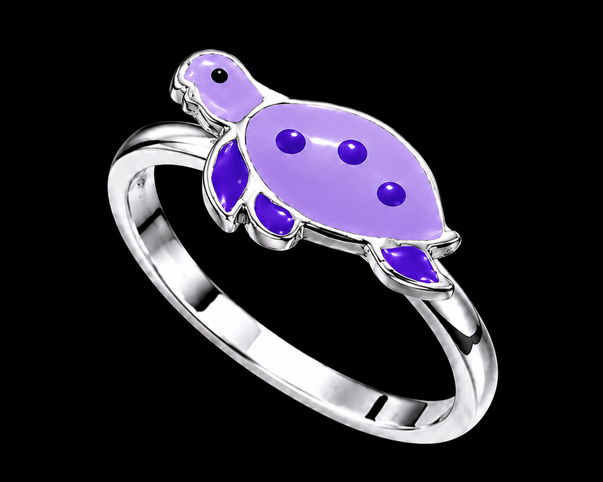 A silver ring with a turtle design and enamel details.