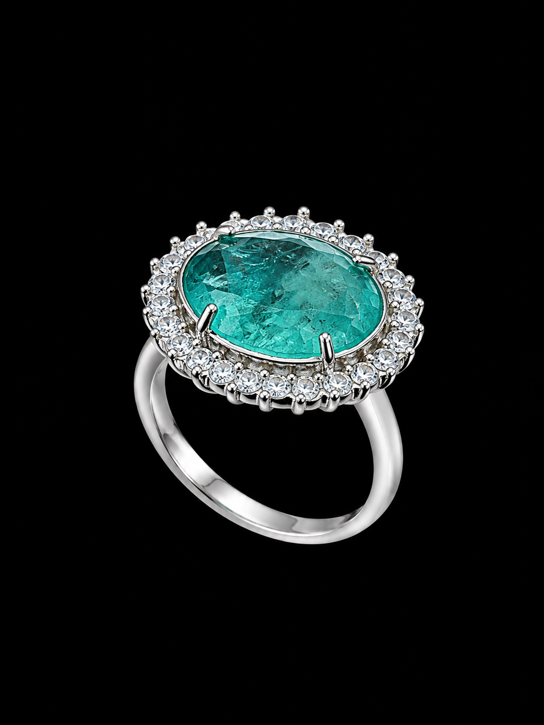 Oval emerald ring with CZ stones in silver-tone metal