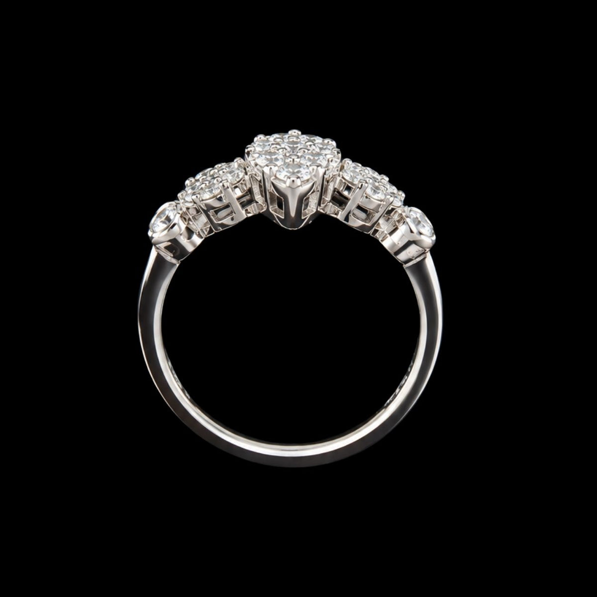 A silver ring with a cluster of CZ stones on a black background.
