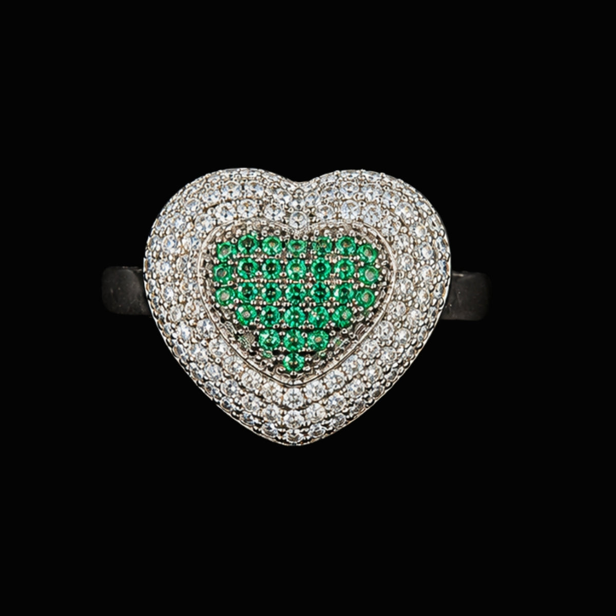 A heart-shaped ring with CZ stones on a silver band.