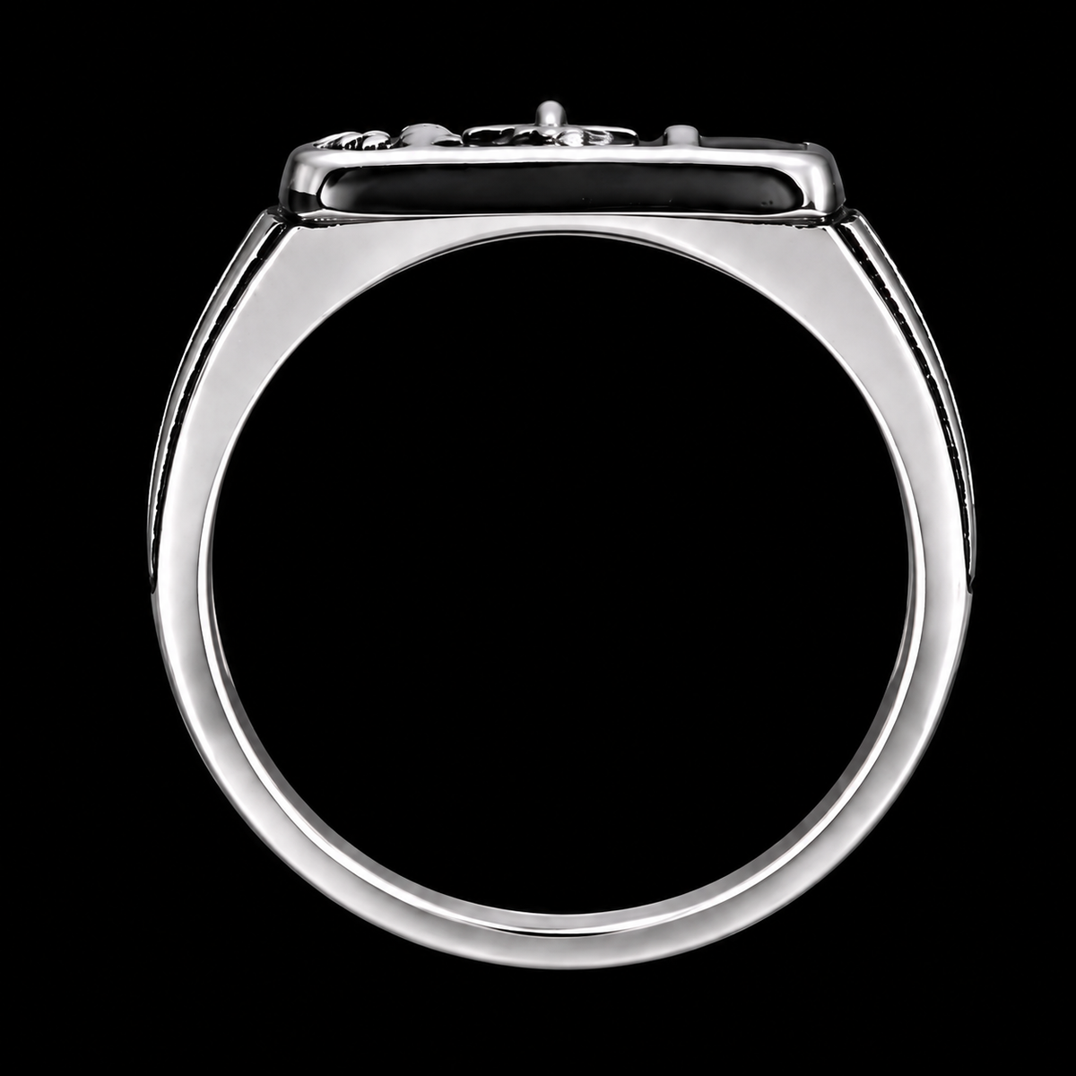 A silver ring with a row of CZ stones on a black background
