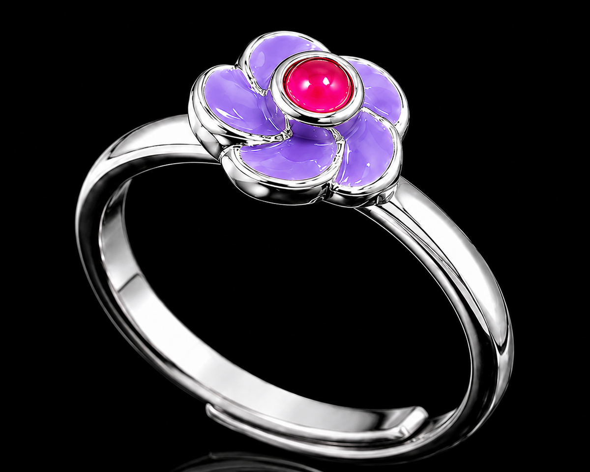 A silver-tone ring with a flower design and pink CZ stone on a black background.