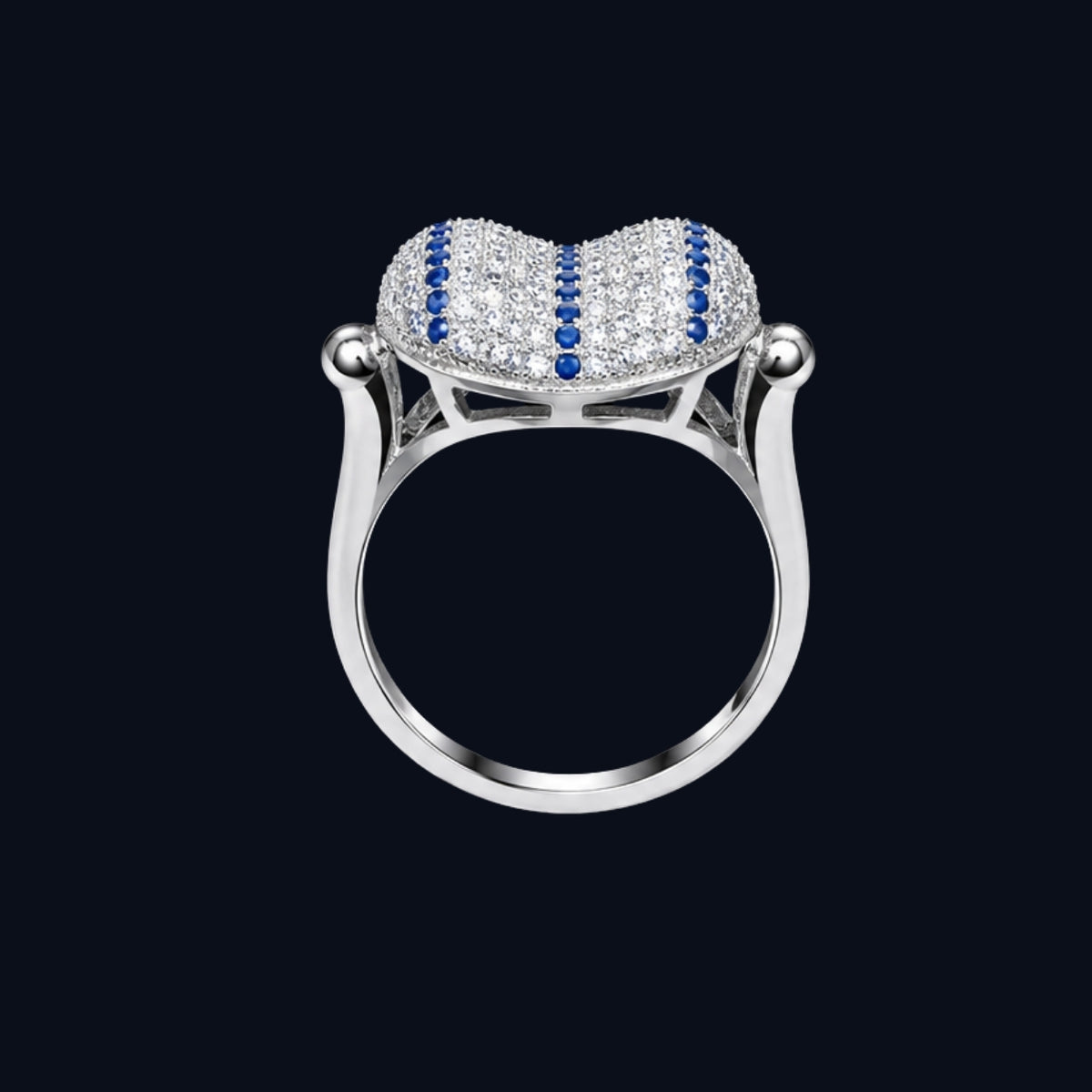 A heart-shaped ring with CZ stones on a silver band.