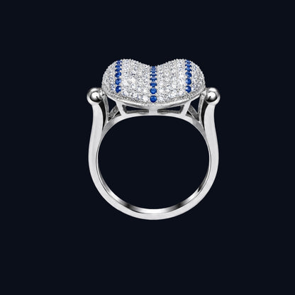 A heart-shaped ring with CZ stones on a silver band.
