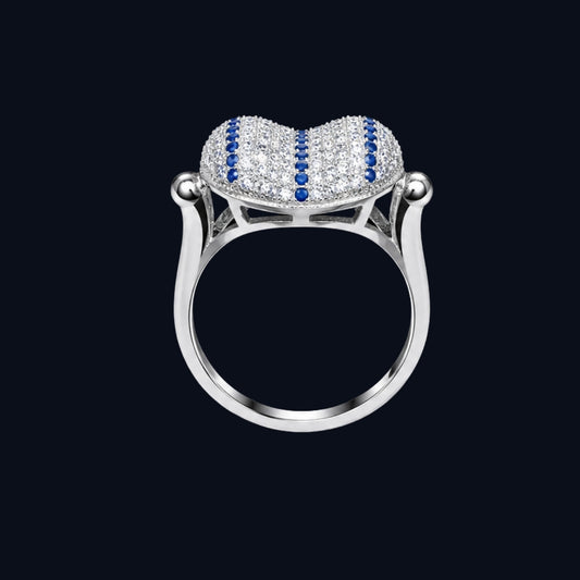 A heart-shaped ring with CZ stones on a silver band.