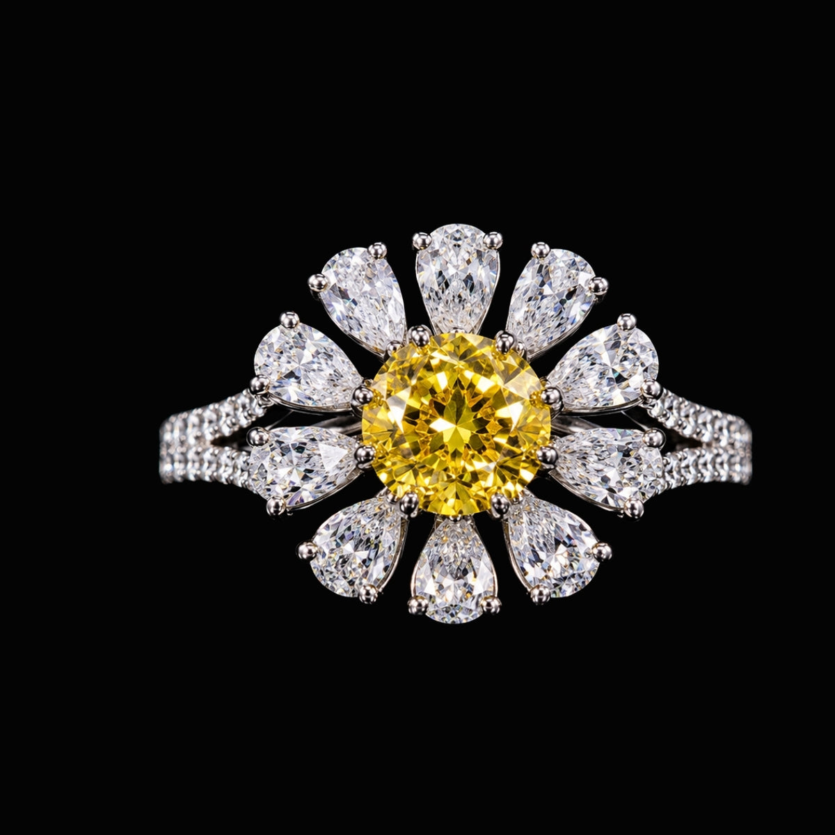 A silver ring with a yellow CZ stone and clear CZ accents on a black background.