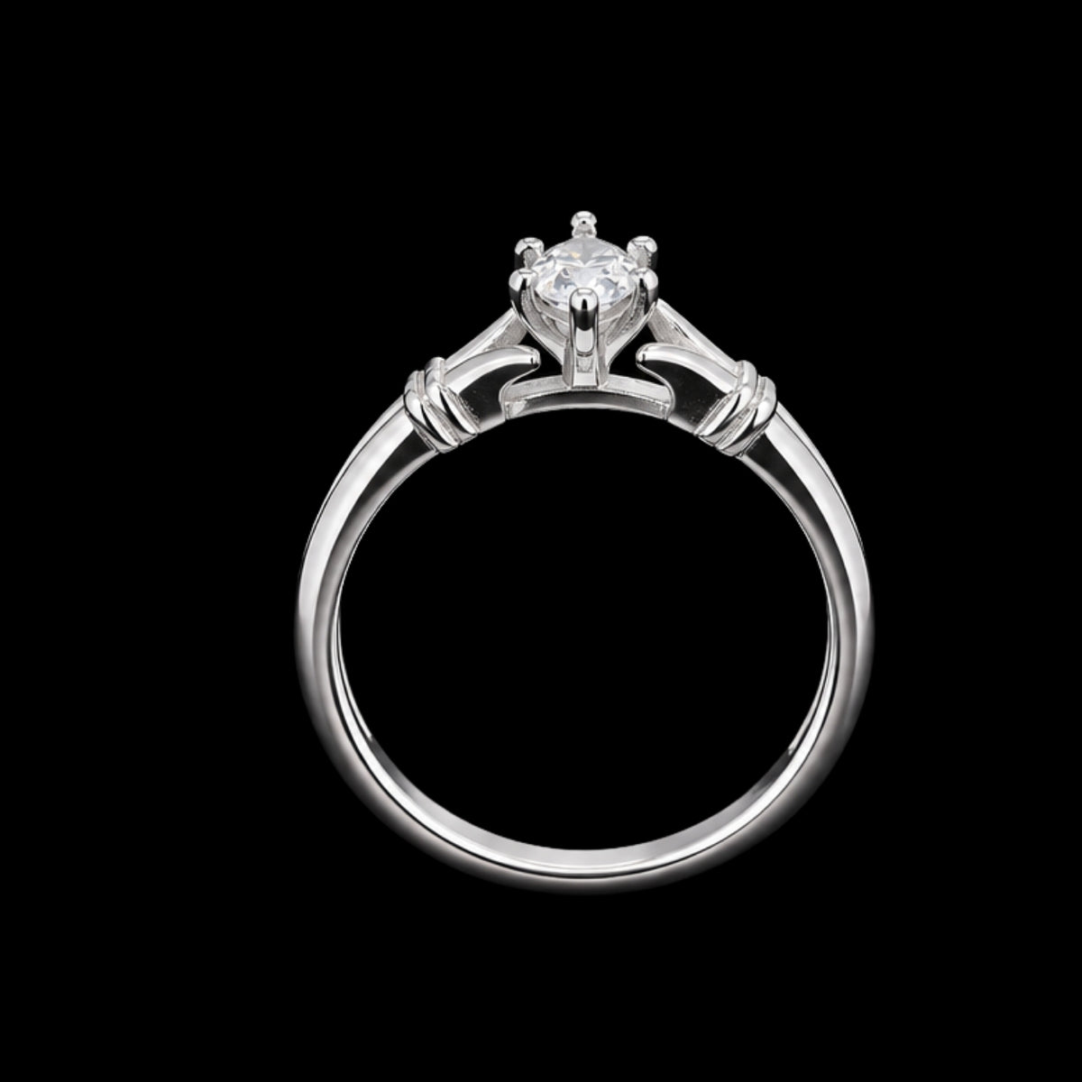 A silver-tone ring with a round-cut cubic zirconia stone set in a prong setting.