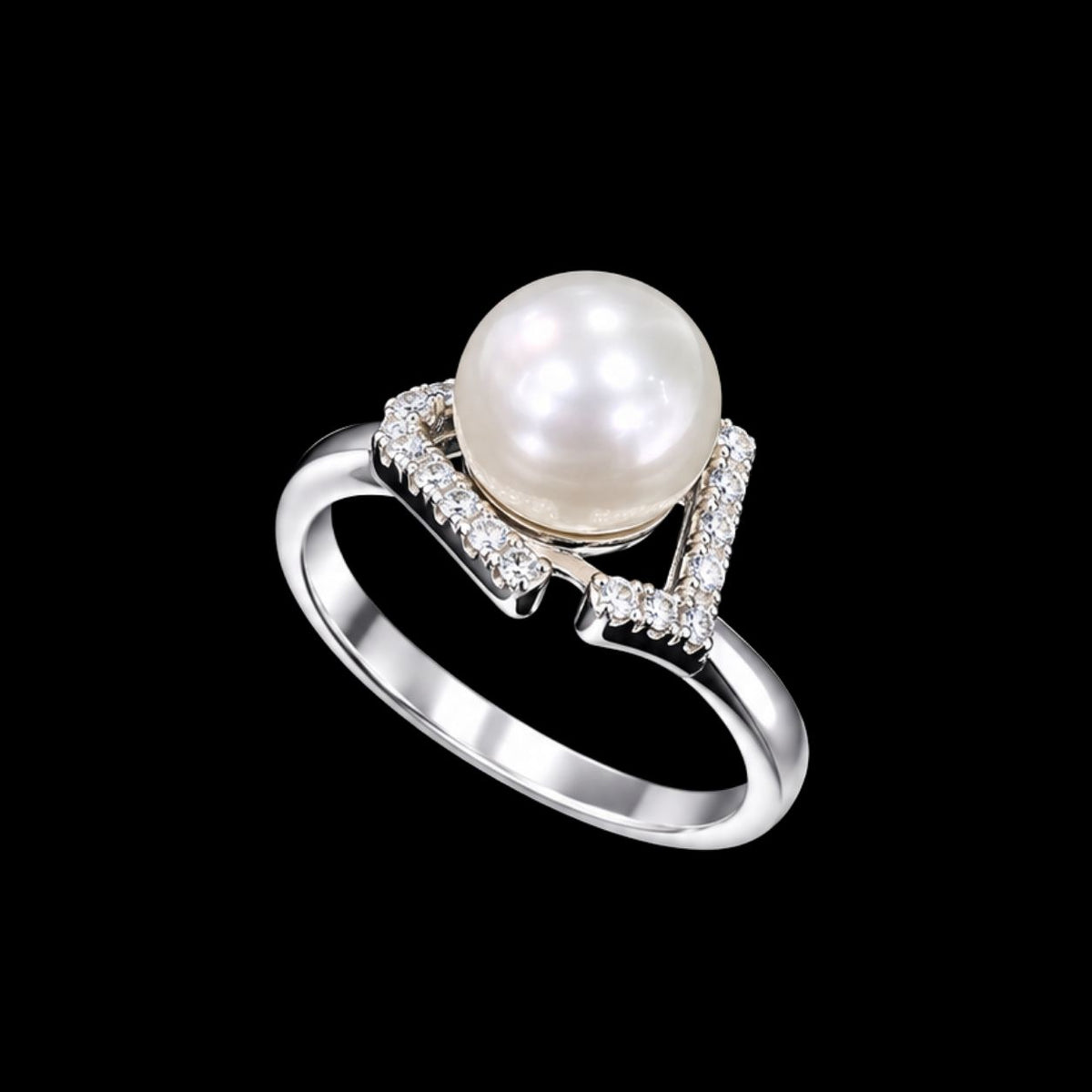 A silver ring with a pearl and CZ stones on a black background.