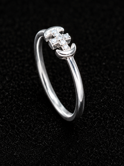A silver ring with a row of clear cubic zirconia stones.