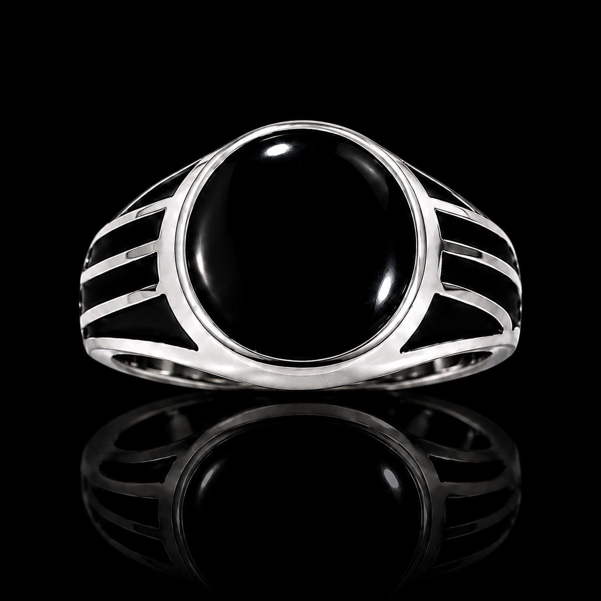 A silver-tone ring with a black onyx stone, set in a geometric design.