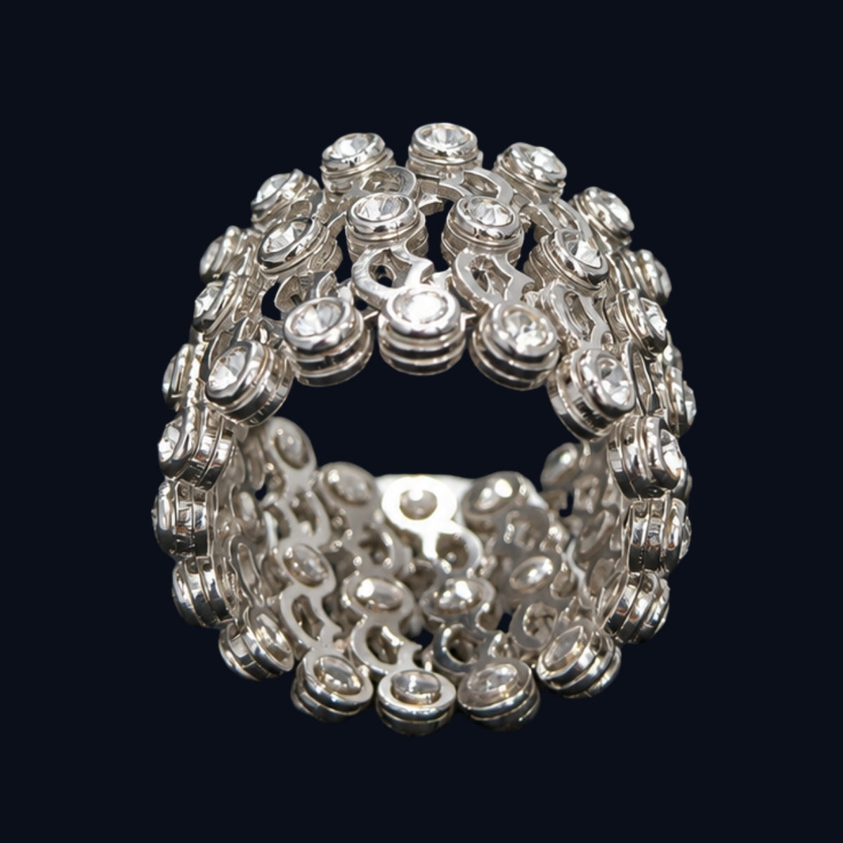 A silver ring with round-cut clear CZ stones.