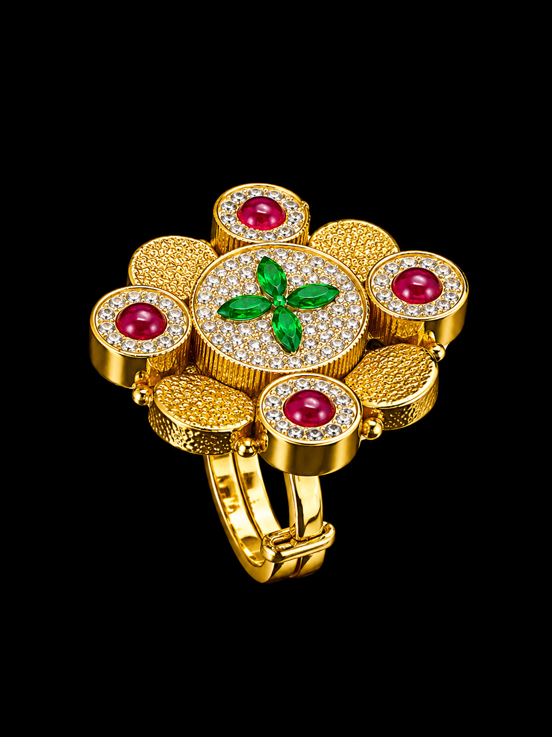 A gold-tone ring with a floral design featuring round-cut rubies and clear CZ stones.