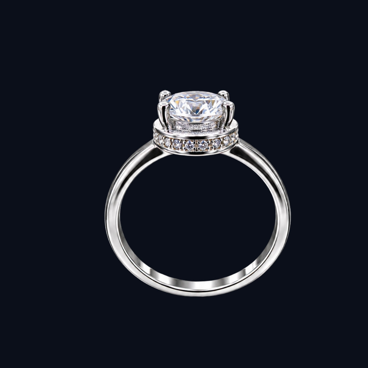 A silver ring with a large, clear CZ stone.