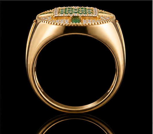 A gold ring with an emerald stone and CZ stones on a black background