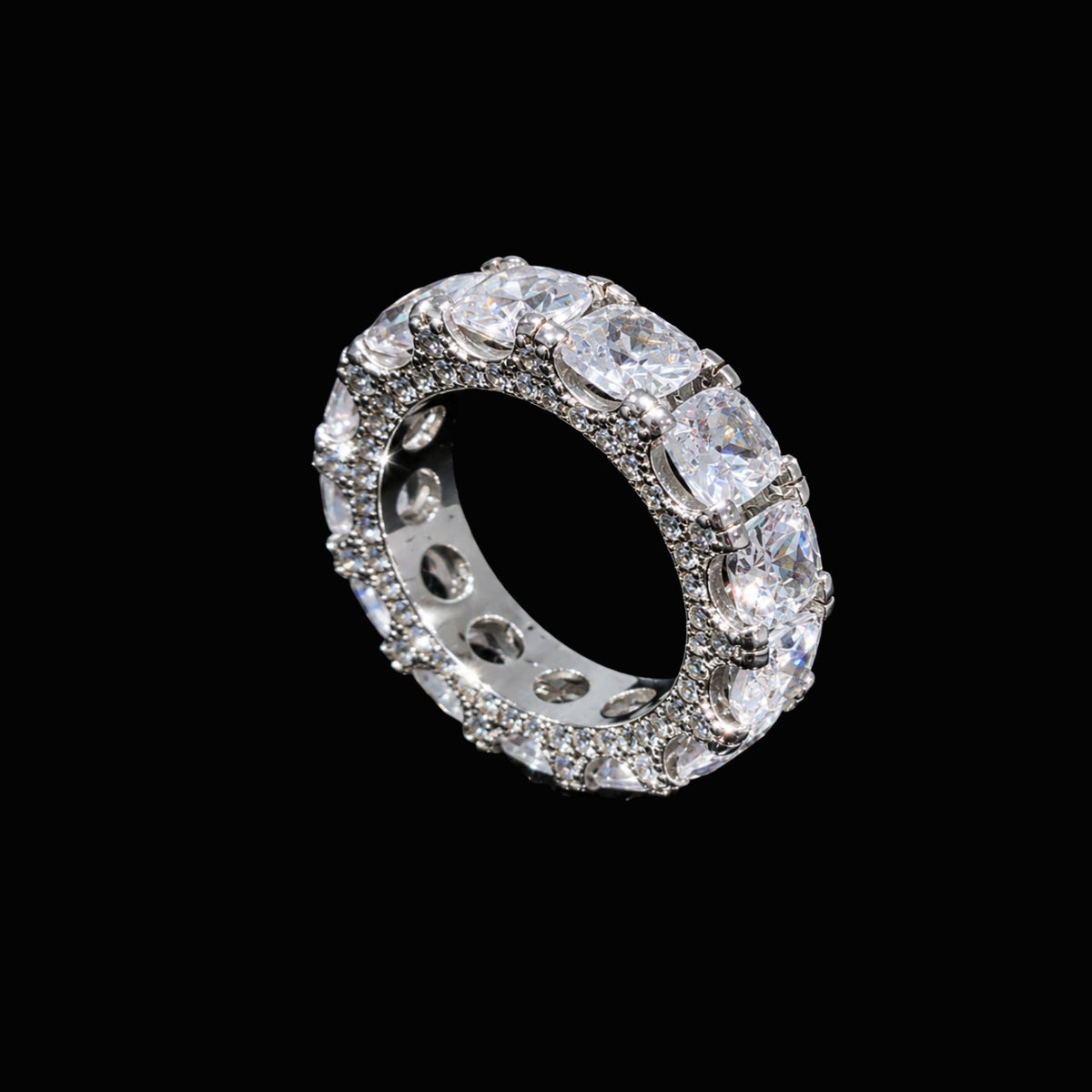 A silver-tone ring with a band of clear CZ stones.