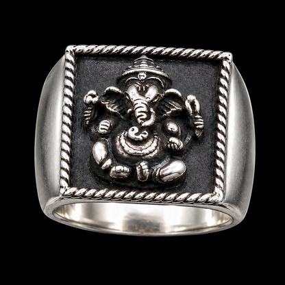 A square silver-tone ring with a Ganesha motif and CZ stone detail.